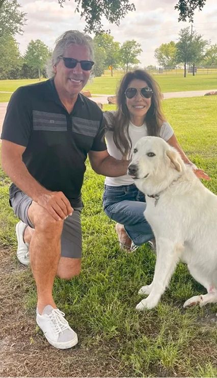A man, woman and their dog